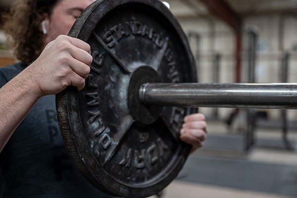 handling plates safely barbell training