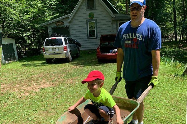 moving a load in a wheelbarrow