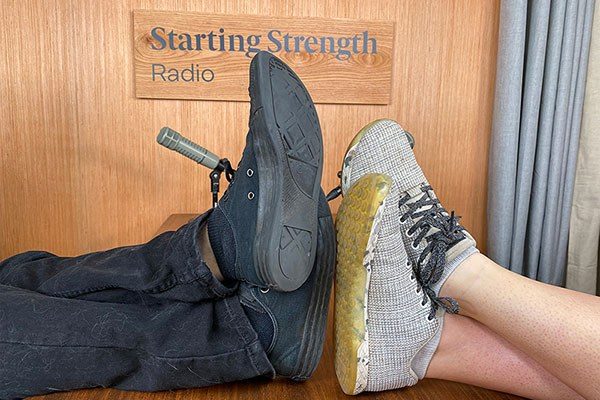 two pairs of tiny feet on the desk at starting strength radio