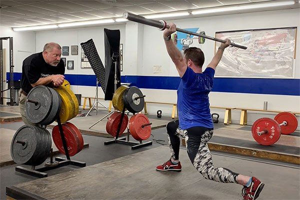 mark rippetoe coaches brent carter in the split snatch