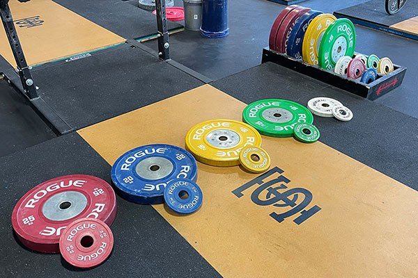 set of bumper plates on a platform