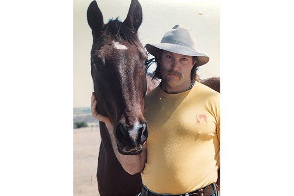 Mark Rippetoe and his horse Thor