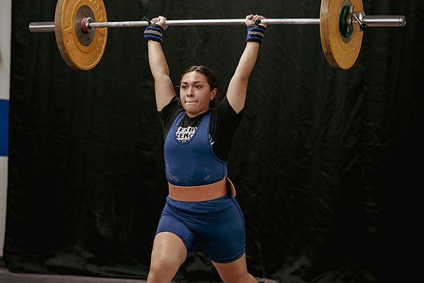 female lifter with a jerk
