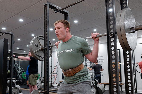 taking a squat out of the starting strength power rack