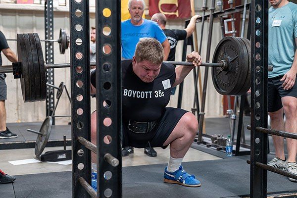 lifter at the bottom of a squat