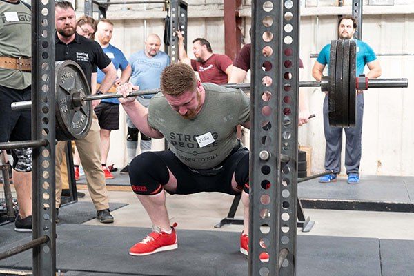 lifter at the bottom of a squat