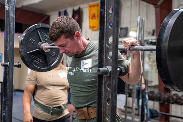 lifter preparing to squat