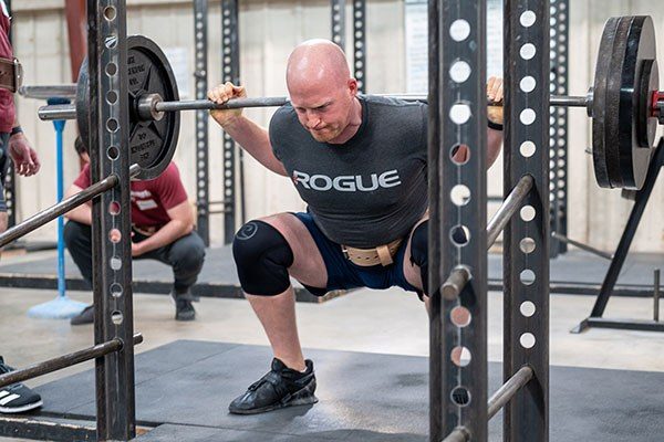 lifter at the bottom of a squat