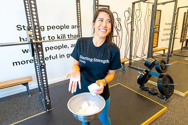 lifter putting chalk on over the chalk box