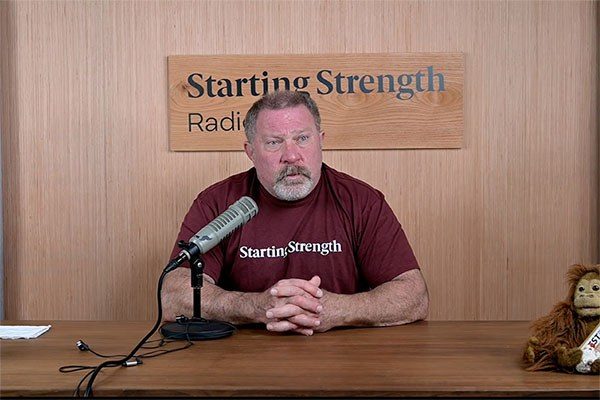 rip behind the desk in the starting strength radio studio