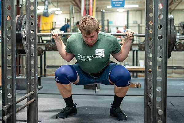 lifter at the bottom of a squat