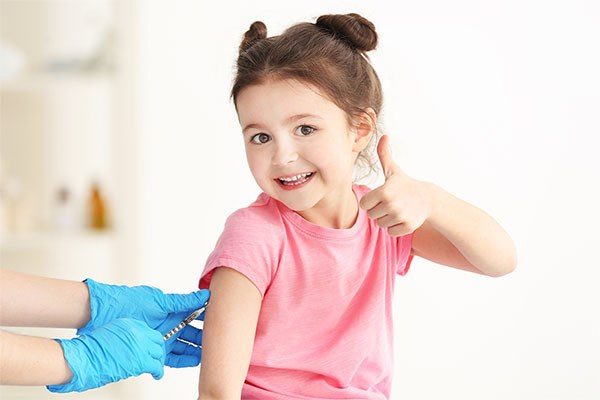 child being injected