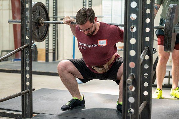 lifter at the bottom of a squat