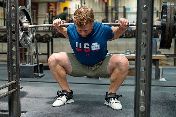 lifter at the bottom of a squat