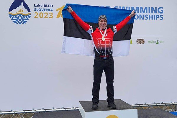 wade stokes medal stand for the 100m breast stroke winter swimming