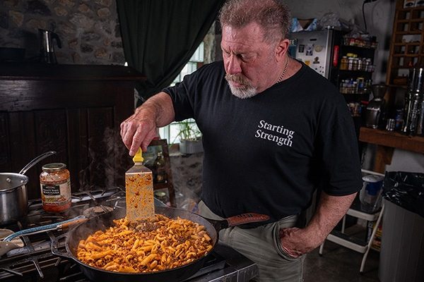 rippetoe stirring a pan of creole spaghetti