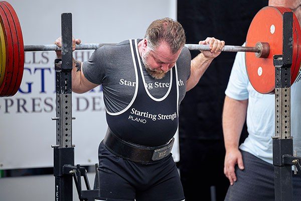 lifter preparing to squat at a strengthlifting meet