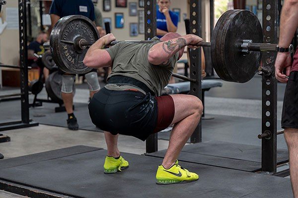 lifter near the bottom of his squat