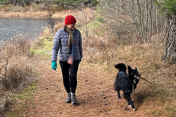 wallace hiking with her dog