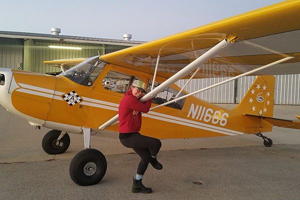 eva next to her plane