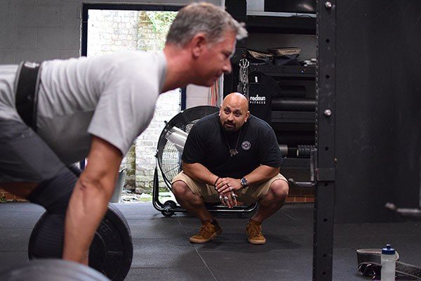 carl raghavan coaching a deadlift