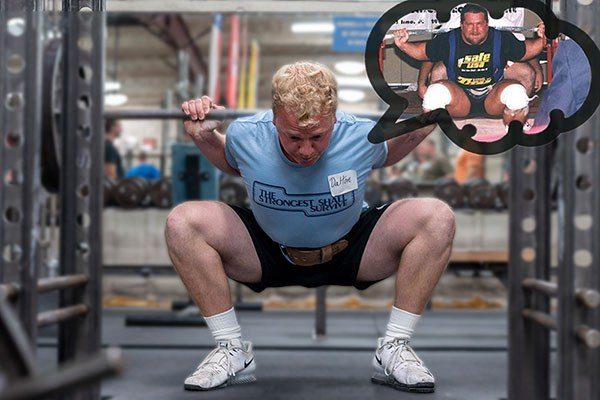 lifter at the bottom of a squat trying to channel kirk karwoski