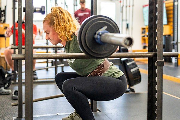 lifter at the bottom of a squat