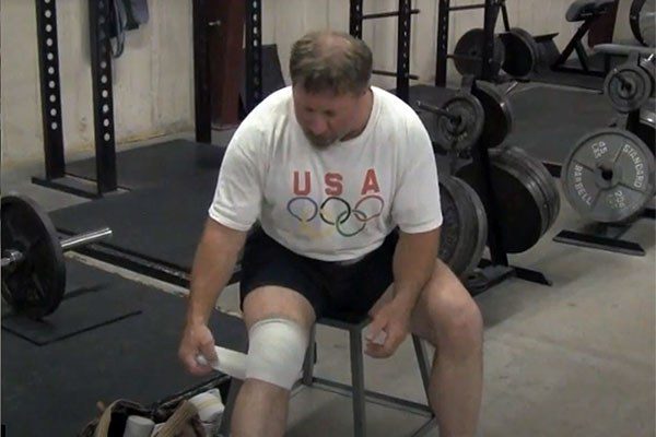 rip demonstrating how to use knee wraps