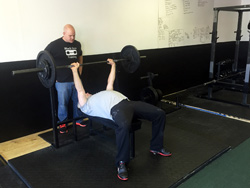 Kurisko coaches Troy on bench